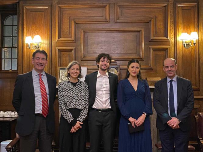 Collette Pakuza and Carlo Mussolini celebrate defending their theses