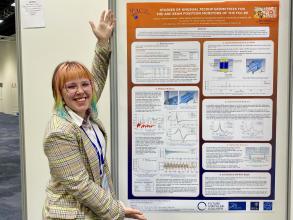Emily Howling next to poster presentation